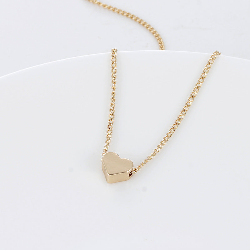 Double-Sided Love Pendant Necklace: A Simple Fashion Statement